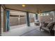 Comfortable patio with stone flooring, outdoor seating, and decorative accents at 1650 S Crismon Rd # 63, Mesa, AZ 85209