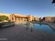 Relaxing community pool area with lounge chairs perfect for soaking up the sun at 1650 S Crismon Rd # 63, Mesa, AZ 85209