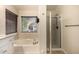 Modern bathroom featuring a soaking tub and glass-enclosed shower for a spa-like experience at 1655 W Stanford Ave, Gilbert, AZ 85233