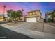 Attractive two-story home with a spacious driveway, mature trees, and well-kept landscaping at 1655 W Stanford Ave, Gilbert, AZ 85233