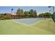 Well-maintained tennis court provides residents with an opportunity for outdoor recreation in the community at 1655 W Stanford Ave, Gilbert, AZ 85233