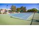 A well-maintained tennis court offers opportunities for active recreation within the community at 1655 W Stanford Ave, Gilbert, AZ 85233