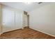 Bedroom features include hardwood floors, closet and a window at 1660 E Zinnia St, Casa Grande, AZ 85122
