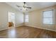 Main bedroom includes wood-look flooring and windows for natural light at 1660 E Zinnia St, Casa Grande, AZ 85122