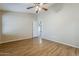 Bedroom with a ceiling fan and door that leads to the rest of the home at 1660 E Zinnia St, Casa Grande, AZ 85122