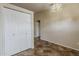 Neutral bedroom with closet, carpet floors, and chandelier lighting at 1660 E Zinnia St, Casa Grande, AZ 85122