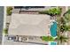 Overhead view of the backyard, featuring an outdoor seating area, an open pool, and a covered patio at 19002 N Arbor Dr, Maricopa, AZ 85138