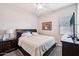 Comfortable bedroom featuring a plush bed, soft lighting, and a relaxing atmosphere, perfect for rest at 19002 N Arbor Dr, Maricopa, AZ 85138