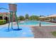 Community pool features a water tower splash pad, providing a refreshing and Gathering-friendly amenity at 19002 N Arbor Dr, Maricopa, AZ 85138
