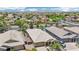 Inviting single-Gathering home with manicured front yard, desert landscaping and mountain views at 19002 N Arbor Dr, Maricopa, AZ 85138