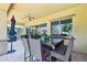 Inviting outdoor dining area featuring stylish furniture and a ceiling fan, perfect for entertaining or relaxing at 19002 N Arbor Dr, Maricopa, AZ 85138