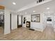 Inviting entryway with wood-look tile, modern decor, and convenient access to other rooms at 19615 N 18Th Dr, Phoenix, AZ 85027