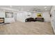 Bright living room with tile flooring, large windows, and neutral tones throughout at 19615 N 18Th Dr, Phoenix, AZ 85027