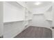 Walk-in closet with shelving and ample storage space at 21532 N 262Nd Ln, Buckeye, AZ 85396