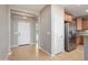 Bright entryway featuring neutral walls, tile flooring, and a view into the home with kitchen access at 21532 N 262Nd Ln, Buckeye, AZ 85396