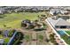 Aerial view of the community park and playground area with a pool in the background at 2518 E Novak Way, Phoenix, AZ 85042