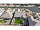 An aerial view of the home showcasing a well-kept backyard and its position on a quiet street at 2518 E Novak Way, Phoenix, AZ 85042