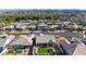 This stunning aerial view captures a home in a neighborhood with mountain views and lush green landscaping at 2518 E Novak Way, Phoenix, AZ 85042