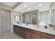 Bathroom features dual sinks, ample counter space, and modern fixtures for convenience at 2518 E Novak Way, Phoenix, AZ 85042