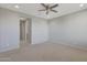 Neutral bedroom features carpet and ceiling fan with great access to other rooms at 2518 E Novak Way, Phoenix, AZ 85042