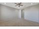 Neutral bedroom features carpet and ceiling fan with great access to other rooms at 2518 E Novak Way, Phoenix, AZ 85042