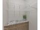 Pantry features wooden cabinets, granite counters, and plenty of white wire shelving for ample storage at 2518 E Novak Way, Phoenix, AZ 85042