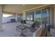 Well-appointed covered patio area with comfortable seating, ideal for outdoor entertaining at 2518 E Novak Way, Phoenix, AZ 85042
