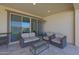 Cozy covered patio with comfortable seating, perfect for outdoor relaxation and gatherings at 2518 E Novak Way, Phoenix, AZ 85042