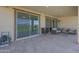Comfortable covered patio with tile flooring and lots of room for entertaining at 2518 E Novak Way, Phoenix, AZ 85042