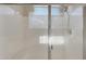 Step into this modern shower with seamless glass and a sleek showerhead for ultimate relaxation at 2518 E Novak Way, Phoenix, AZ 85042