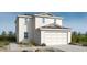 Charming two-story home featuring a two-car garage and low maintenance desert landscaping at 25204 N 165Th Ln, Surprise, AZ 85387