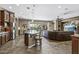 Open kitchen flows into Gathering room, connecting indoor and outdoor living at 27421 N 22Nd Ln, Phoenix, AZ 85085