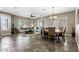 Open-concept living space showcasing living room and dining area at 27421 N 22Nd Ln, Phoenix, AZ 85085