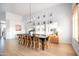 Bright dining area with large table, seating for ten, and stylish decor at 2982 S Holguin Way, Chandler, AZ 85286