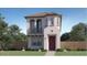 Charming two-story home with stucco exterior, tiled roof, balcony, and desert landscaping at 3339 S Lily Ave, Mesa, AZ 85212