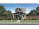 Charming two-story home with a well-manicured lawn and lush landscaping at 3344 S Lotus Ave, Mesa, AZ 85212