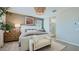 Comfortable main bedroom with a neutral color scheme and access to a luxurious bath at 3344 S Lotus Ave, Mesa, AZ 85212
