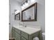 Bathroom featuring a vanity, mirror, and modern lighting at 3893 E Gideon Way, Gilbert, AZ 85296