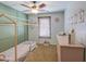 Bedroom featuring a bed frame, neutral walls, and ceiling fan at 3893 E Gideon Way, Gilbert, AZ 85296