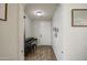 Well-lit entryway featuring hardwood floors and a welcoming atmosphere at 3893 E Gideon Way, Gilbert, AZ 85296