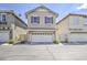 Charming two-story home featuring a two-car garage, neutral-toned exterior, and neatly manicured landscaping at 3893 E Gideon Way, Gilbert, AZ 85296