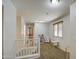 Carpeted upstairs hallway with play area near a window with blinds at 3893 E Gideon Way, Gilbert, AZ 85296