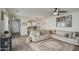Bright living area featuring a spacious layout and access to the kitchen, ideal for modern living at 3893 E Gideon Way, Gilbert, AZ 85296