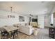 Open-concept living room boasting ample space, stylish decor, and abundant natural light for gatherings at 3893 E Gideon Way, Gilbert, AZ 85296