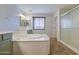 Bright main bathroom showcasing a large soaking tub and a glass shower at 3893 E Gideon Way, Gilbert, AZ 85296