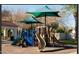 Fun community playground with climbing structures, slides, and shaded areas for children to enjoy at 3893 E Gideon Way, Gilbert, AZ 85296