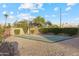 Outdoor basketball court with a well-maintained playing surface and surrounding landscaping at 4220 E San Angelo Ave, Gilbert, AZ 85234