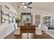 Bright dining room with stylish chairs, decor, and a view of the backyard at 4220 E San Angelo Ave, Gilbert, AZ 85234