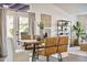 Inviting dining area with a modern table, chairs, and natural light at 4220 E San Angelo Ave, Gilbert, AZ 85234