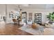 Open dining area with stylish furniture, a modern ceiling fan, and great natural light at 4220 E San Angelo Ave, Gilbert, AZ 85234
